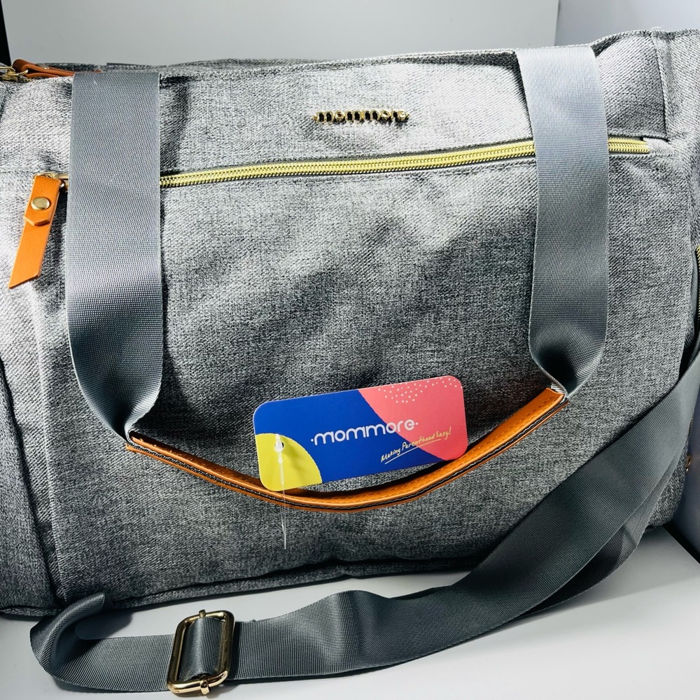 Mommore diaper & breast pump bag with changing pad. NWT